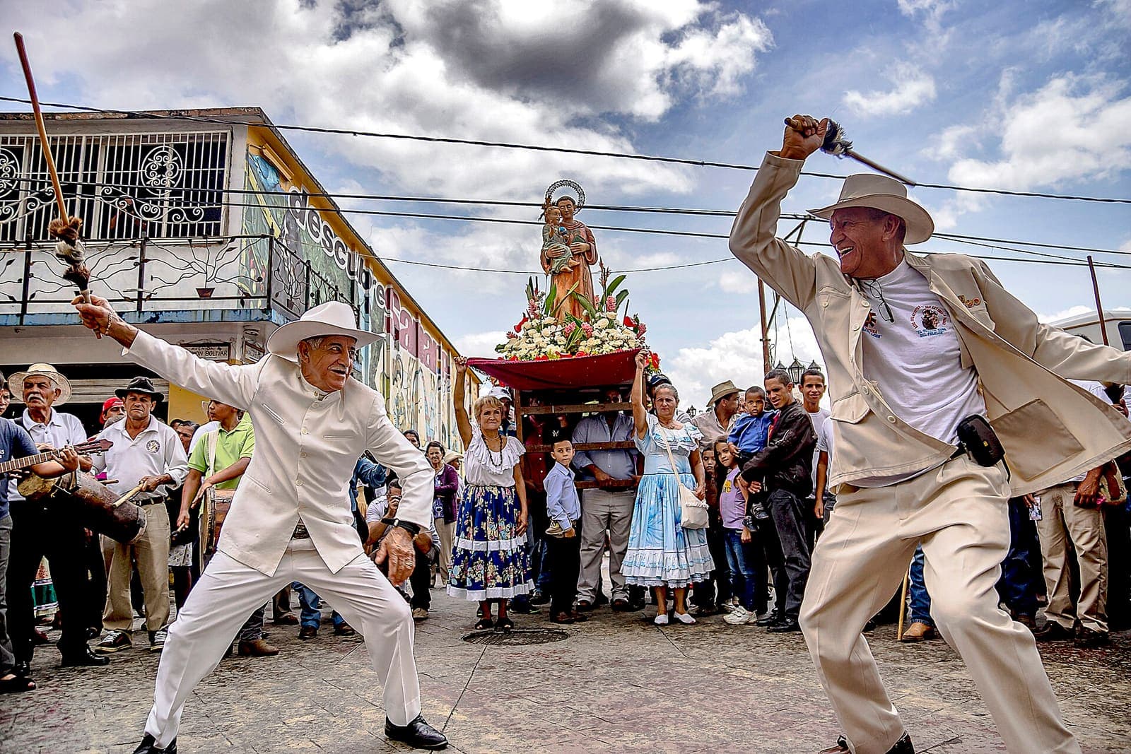 Tamunangue dancers perform the son El Galerón, with musicians in the background