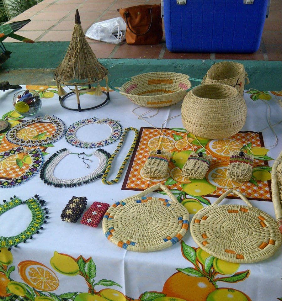 Handwoven baskets stacked at a crafts stall in Tintorero
